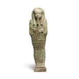 An Egyptian green glazed faience shabti for Ankh-Sma-Tawy