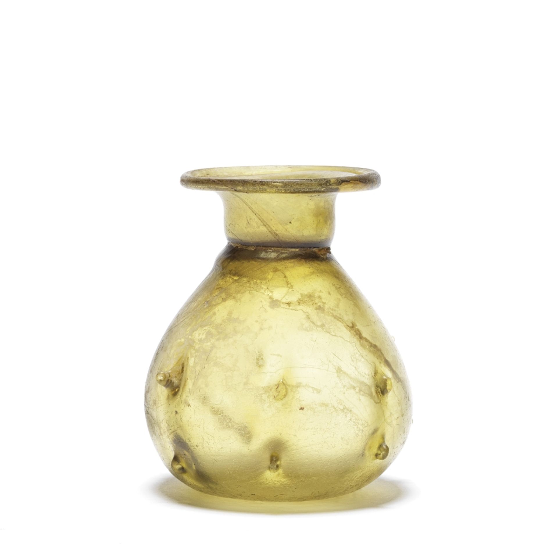 A Roman olive-green glass sprinkler flask