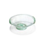 A Roman pale green glass bowl