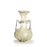 A Roman pale yellow glass amphora