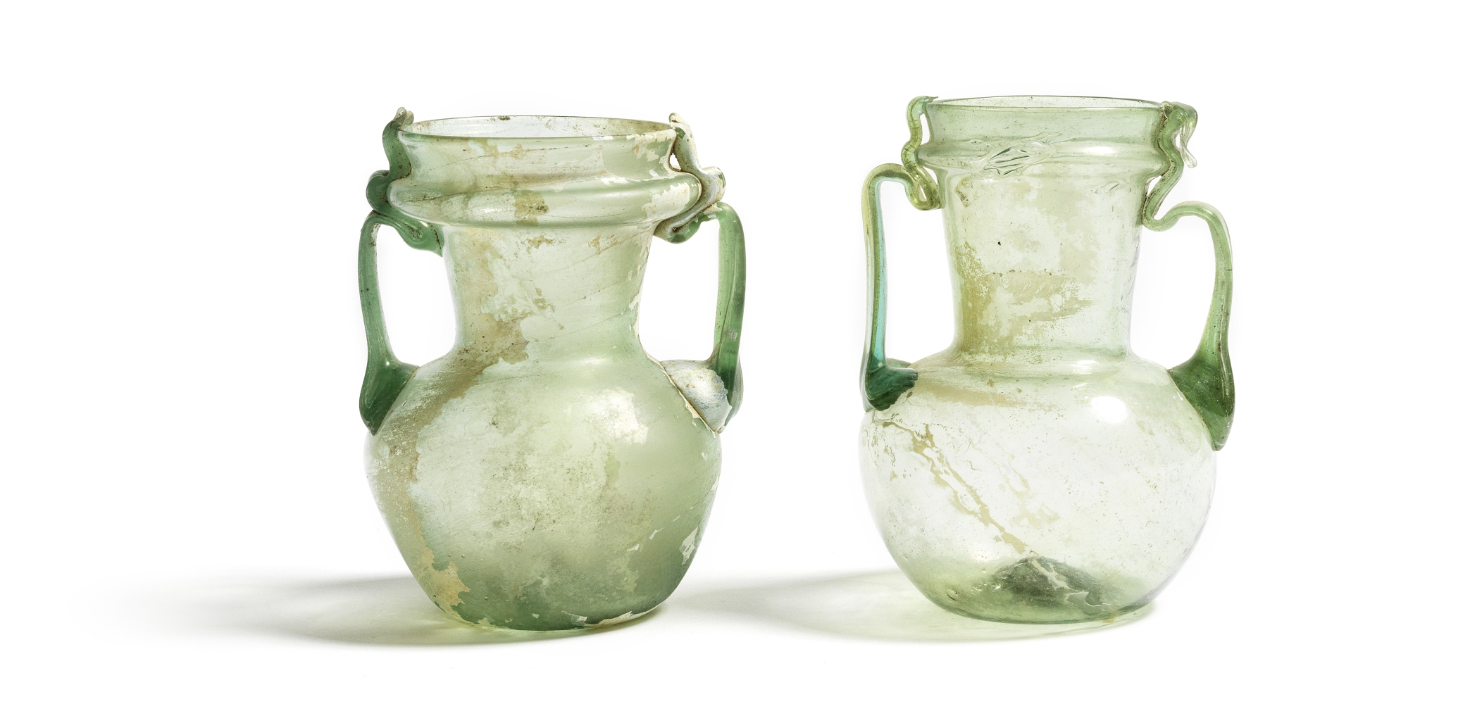 Two Roman green glass two-handled jars 2