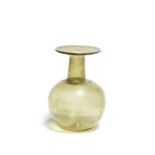 A Roman pale yellow glass sprinkler flask