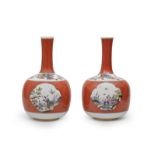 An extremely rare pair of Meissen red-ground bottle vases, circa 1735