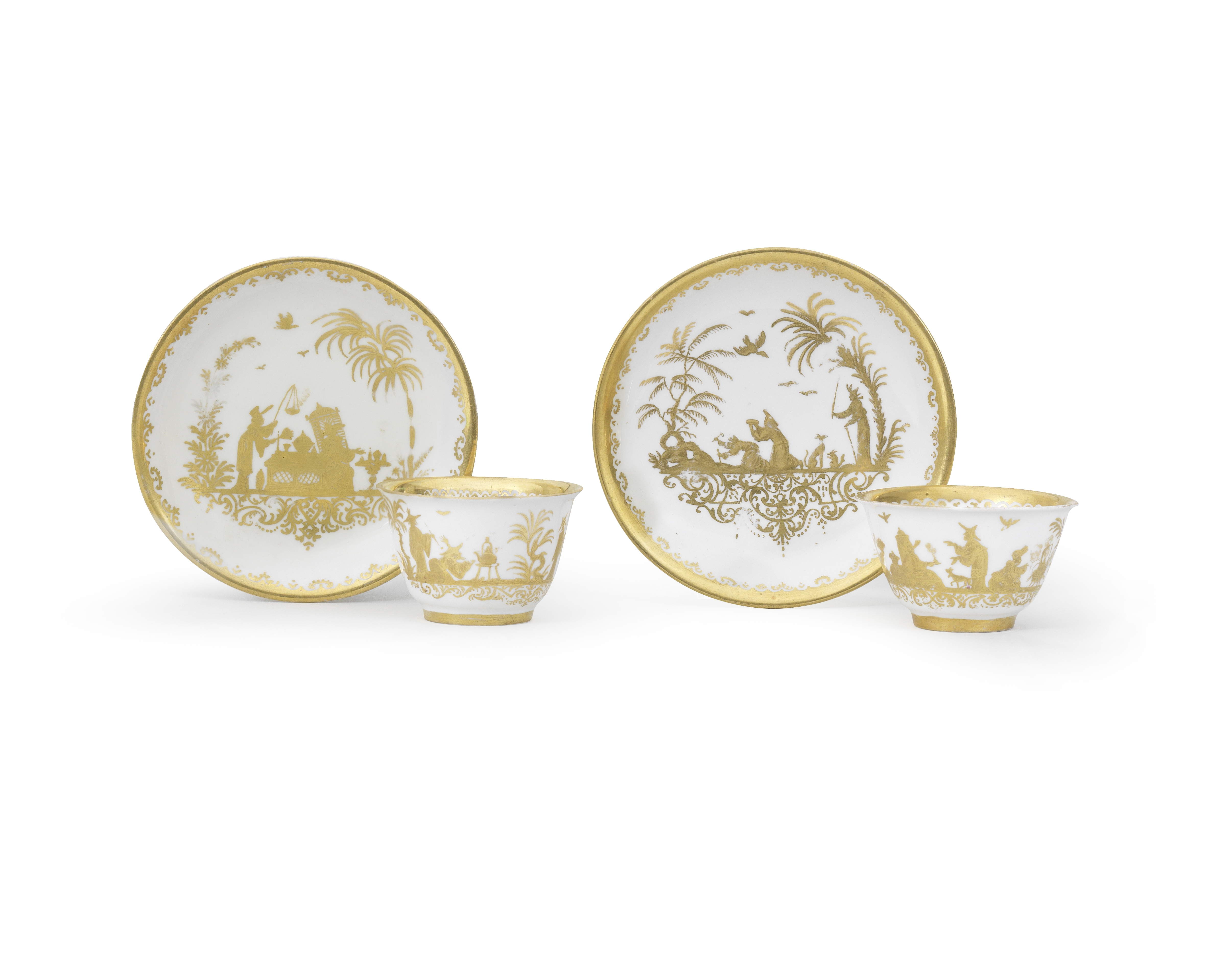 A pair of Meissen Hausmaler teabowls and saucers, the porcelain circa 1720