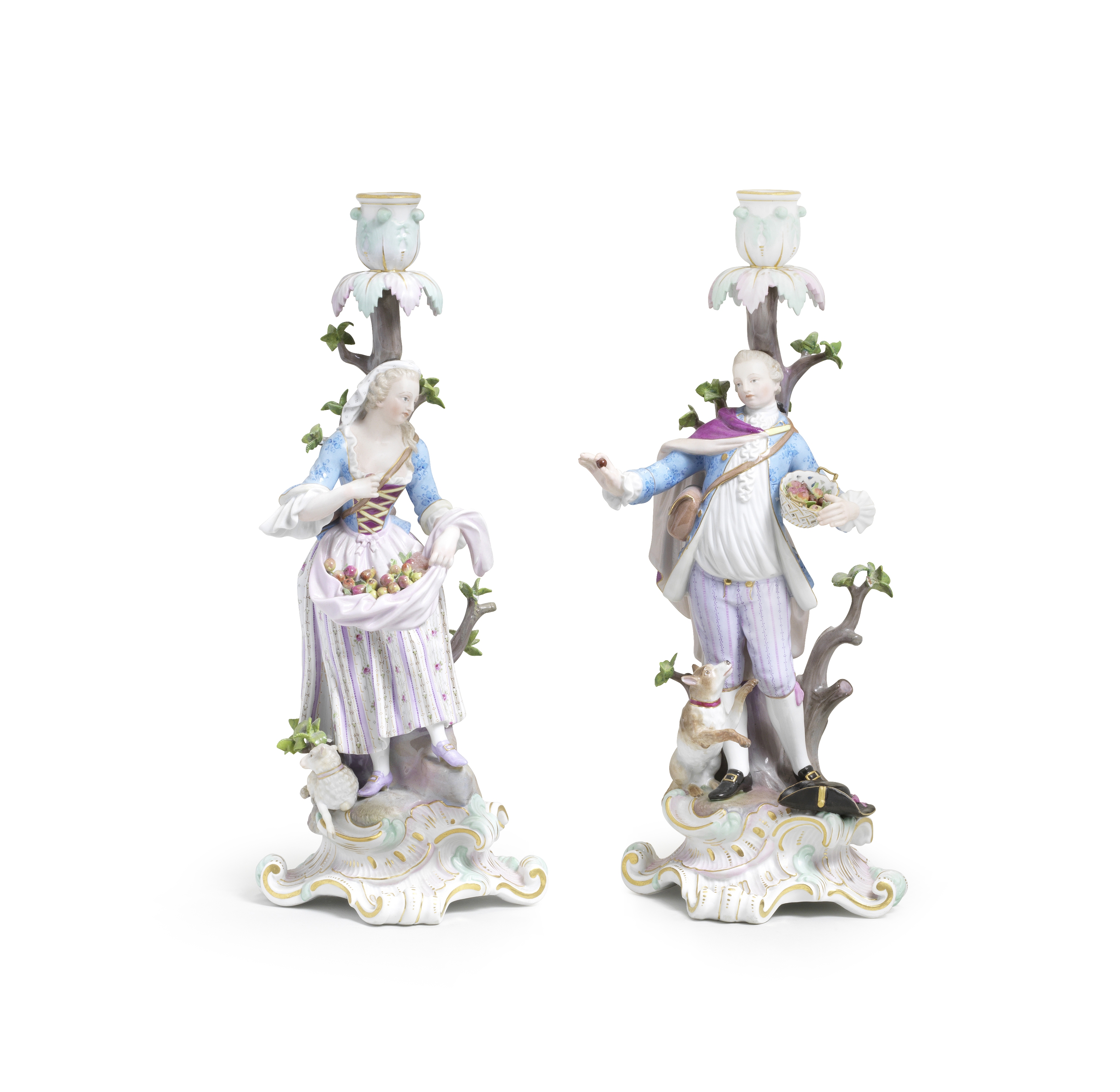 A pair of Meissen figural candlesticks together with a Meissen candlestick allegorical of Winter,...
