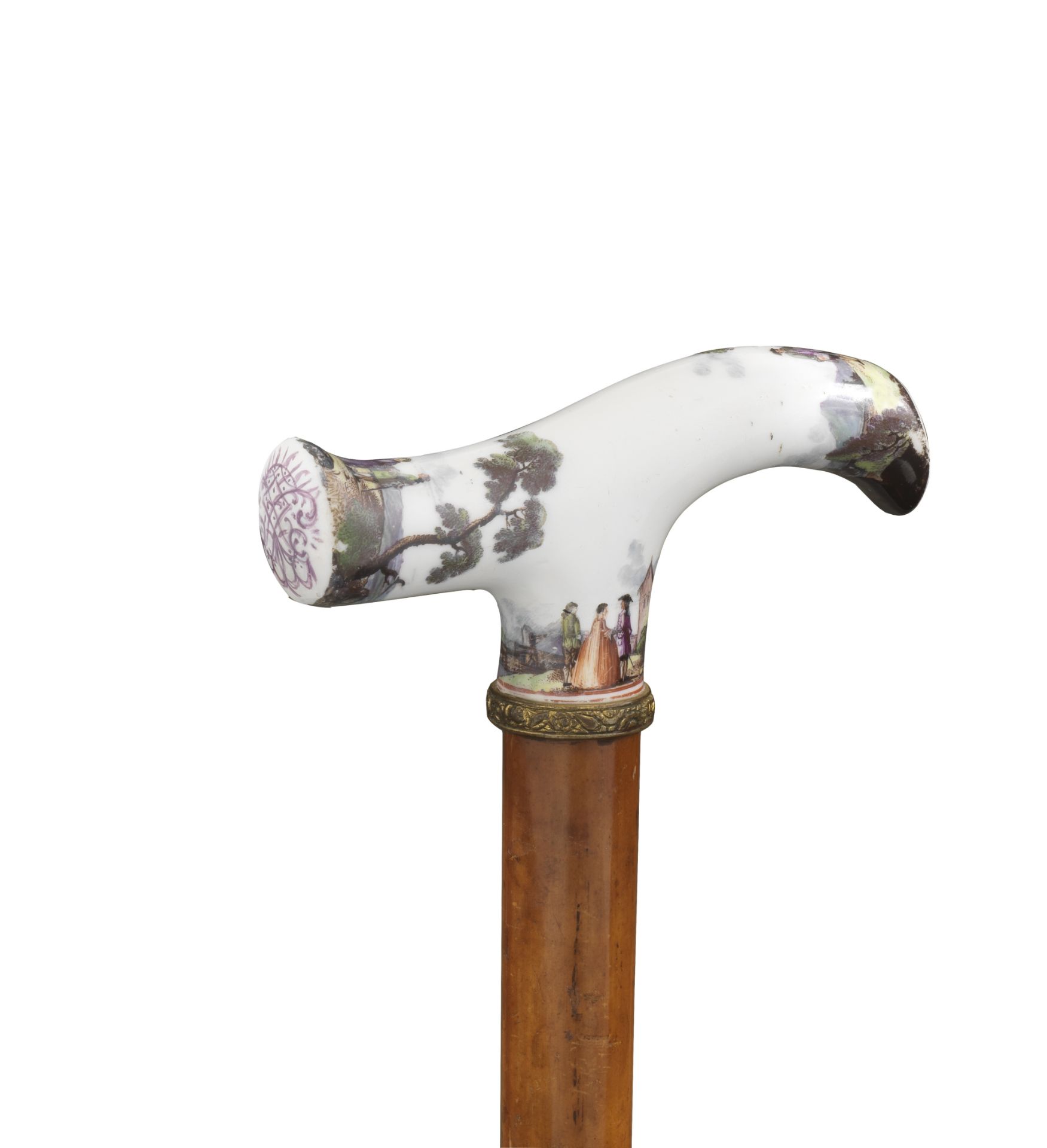 A Meissen cane handle decorated with European landscapes, mid 18th century
