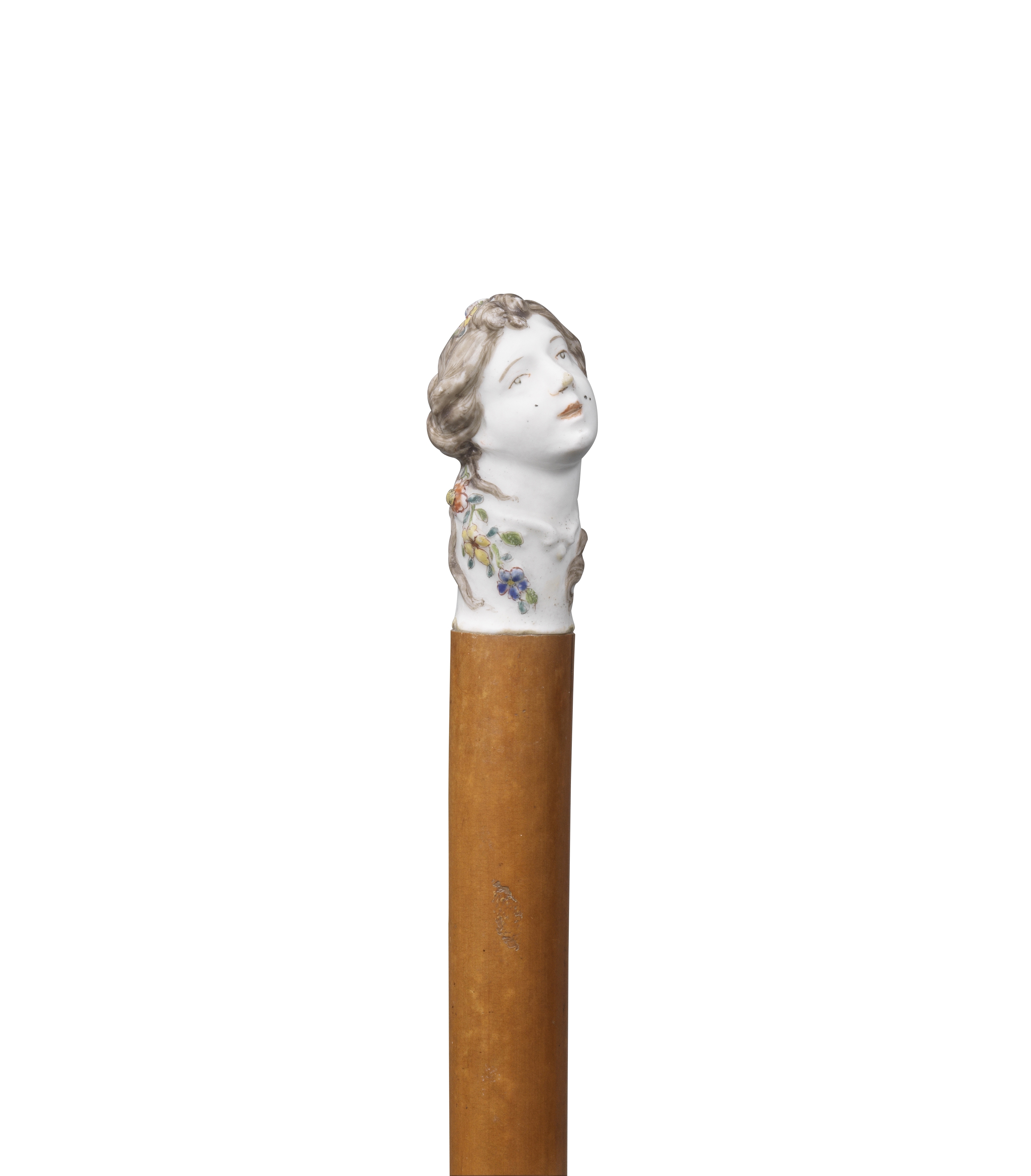 A Chelsea porcelain cane handle, mid 18th century