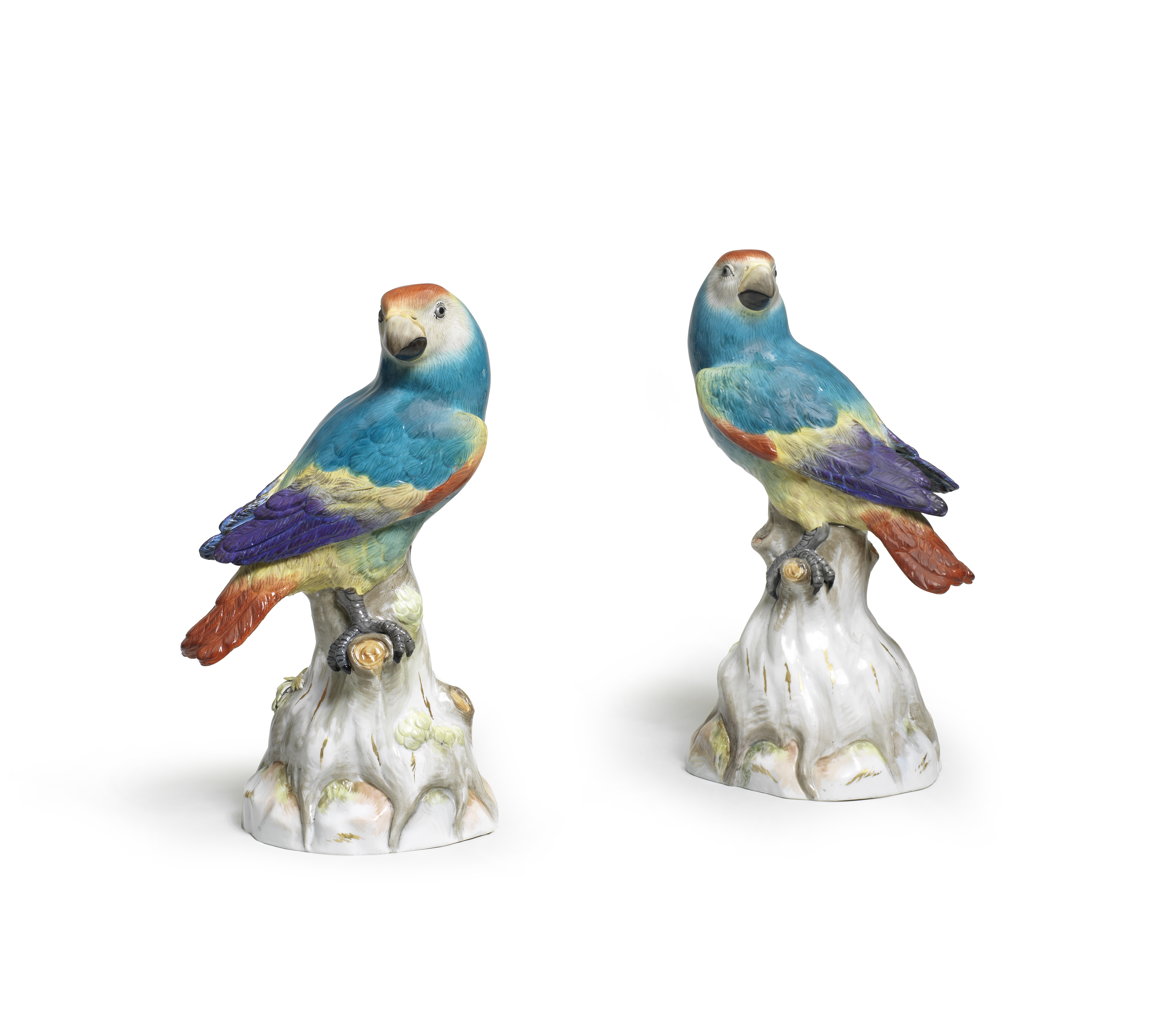 A pair of Meissen models of parrots, late 19th century