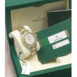 Rolex. A fine 18K gold and stainless steel automatic chronograph bracelet watch Cosmograph Dayto...