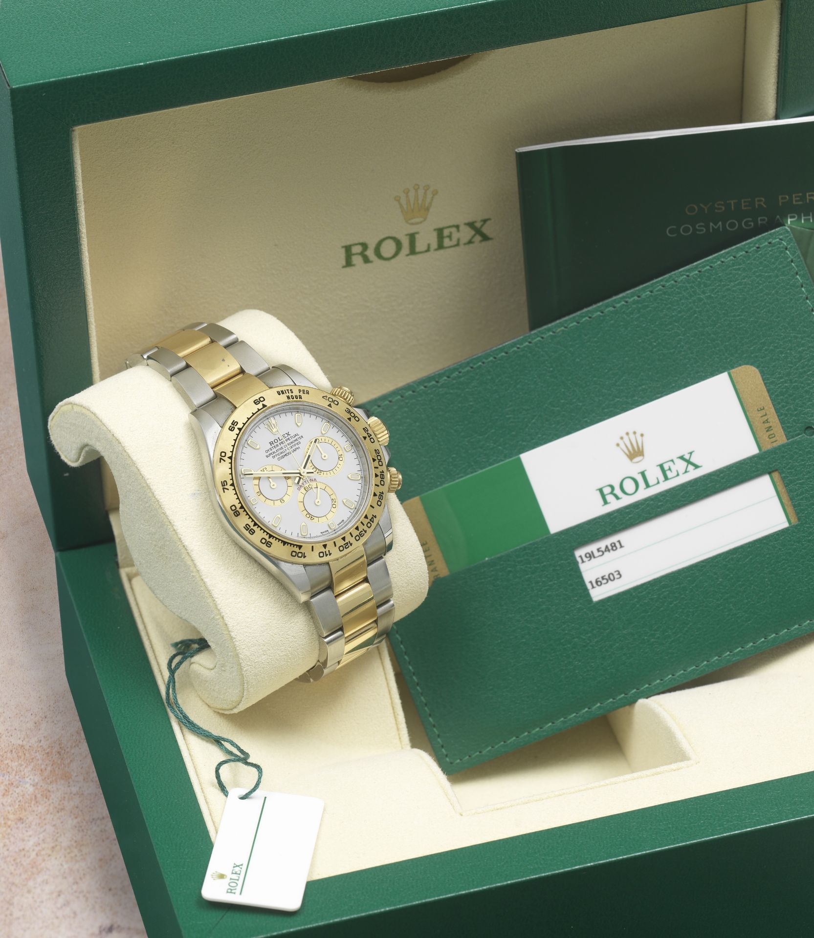 Rolex. A fine 18K gold and stainless steel automatic chronograph bracelet watch Cosmograph Dayto...