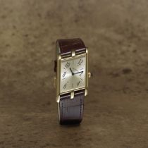 Cartier. A fine and rare Limited Edition 18K gold manual wind asymmetrical wristwatch Tank Asym&...