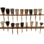 A large collection of eighteen shaker brushes Late 19th century and later (18)
