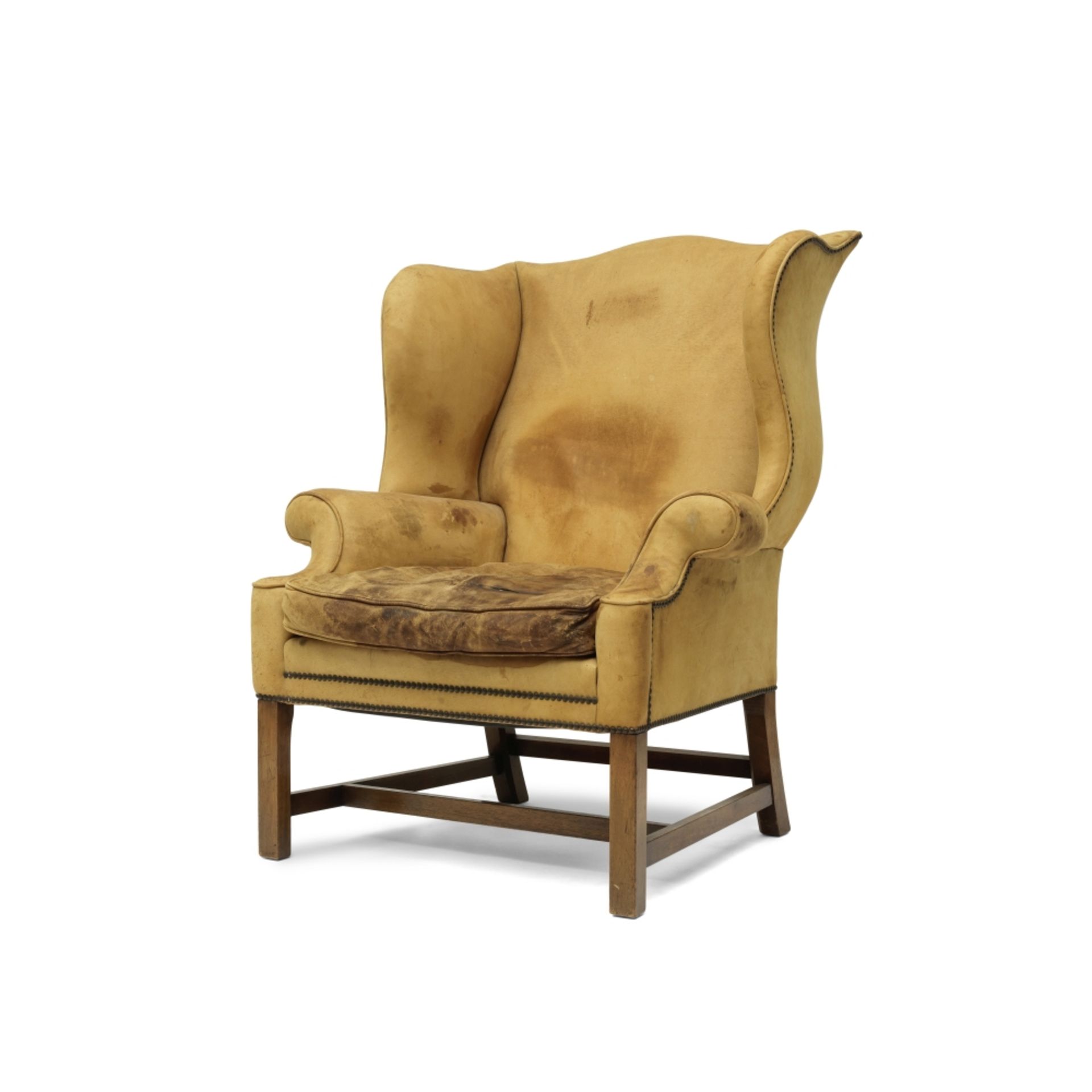 A George III style wingback armchair First half 20th century