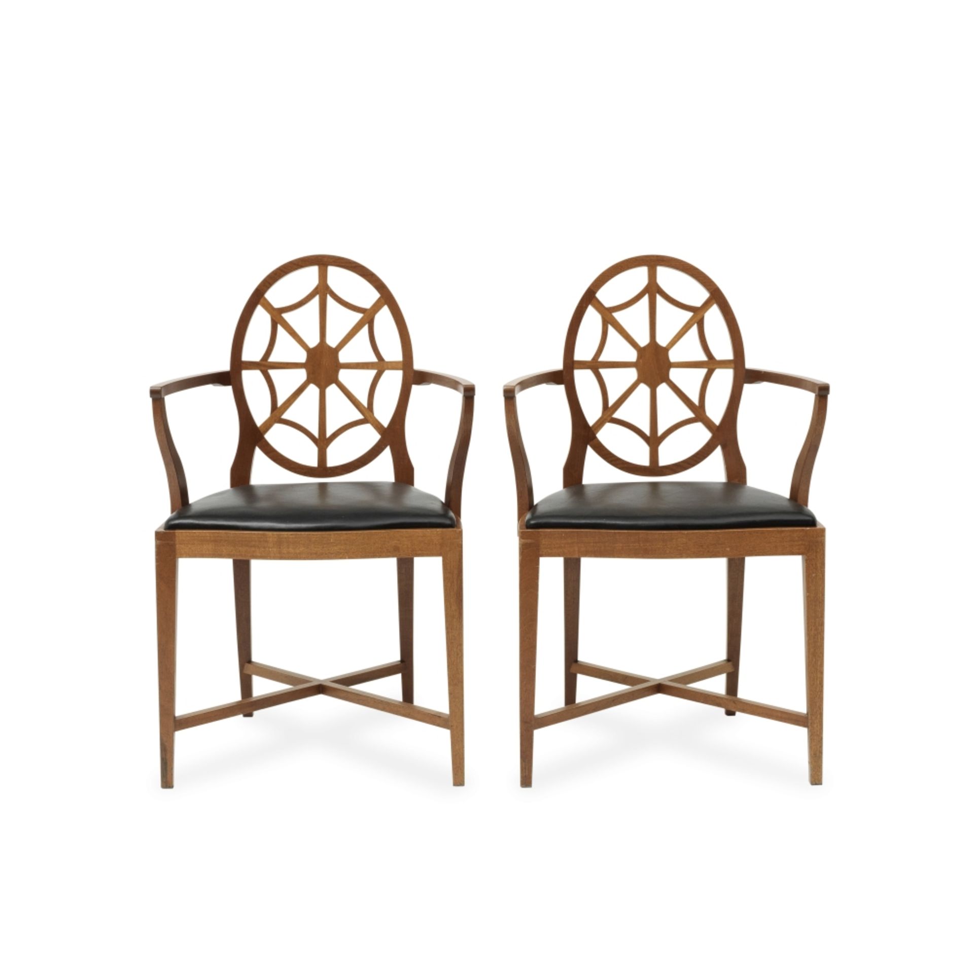 A pair of teak armchairsAfter the 'Spiderback' design by Sir Edwin Lutyens (2)