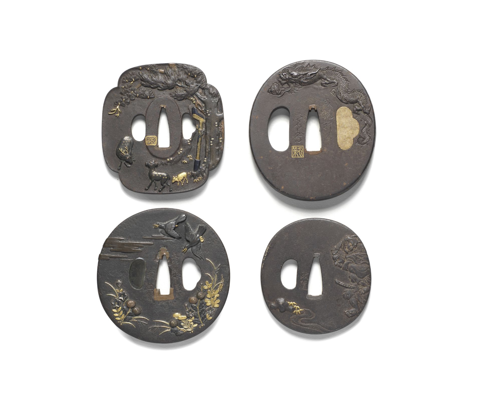 FOUR IRON TSUBA (HAND GUARDS) Edo period (1615-1868), late 18th to 19th century (4)