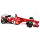 A 1:5 scale limited edition model of Michael Schumacher's Ferrari F2002 Championship winning Form...