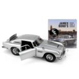 A finely detailed 1:8 scale model of the James Bond 'Goldfinger' Aston Martin DB5 by Eaglemoss, ...