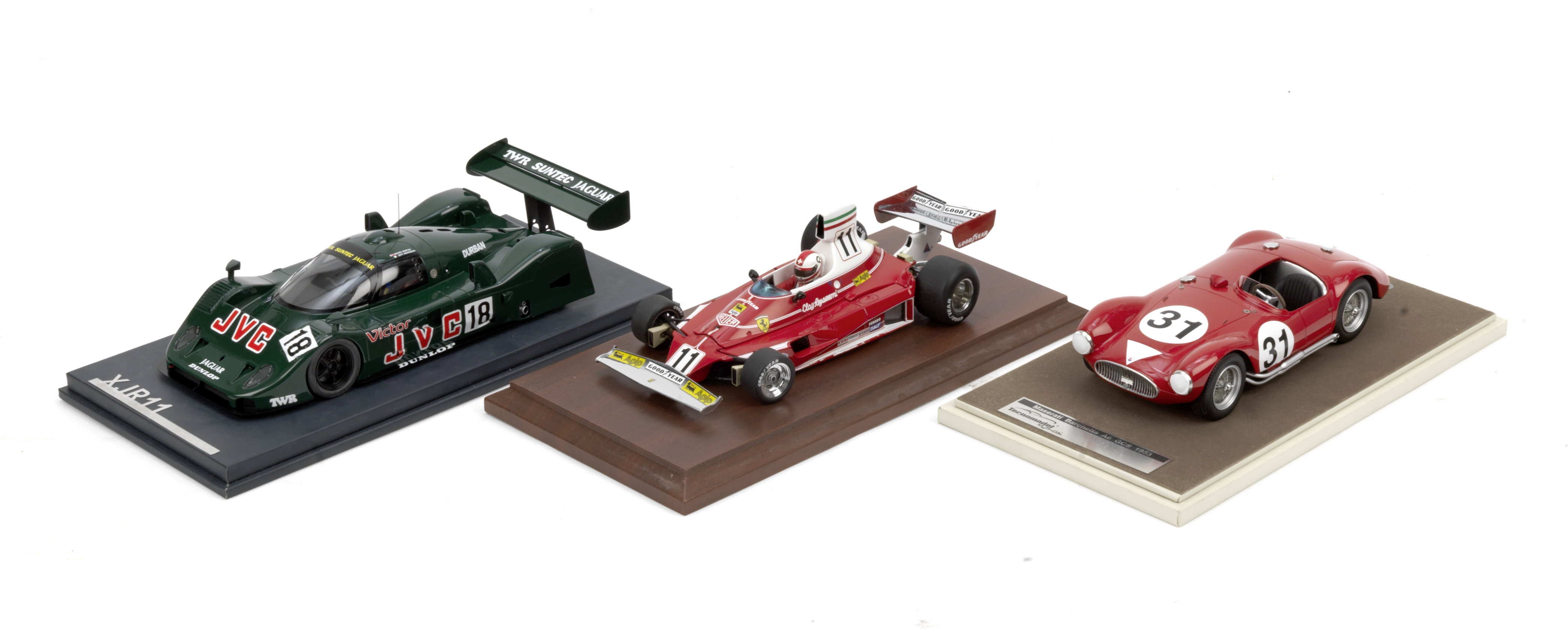 Three 1:18 scale racing models, ((3))