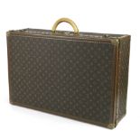 A Louis Vuitton suitcase, modern,