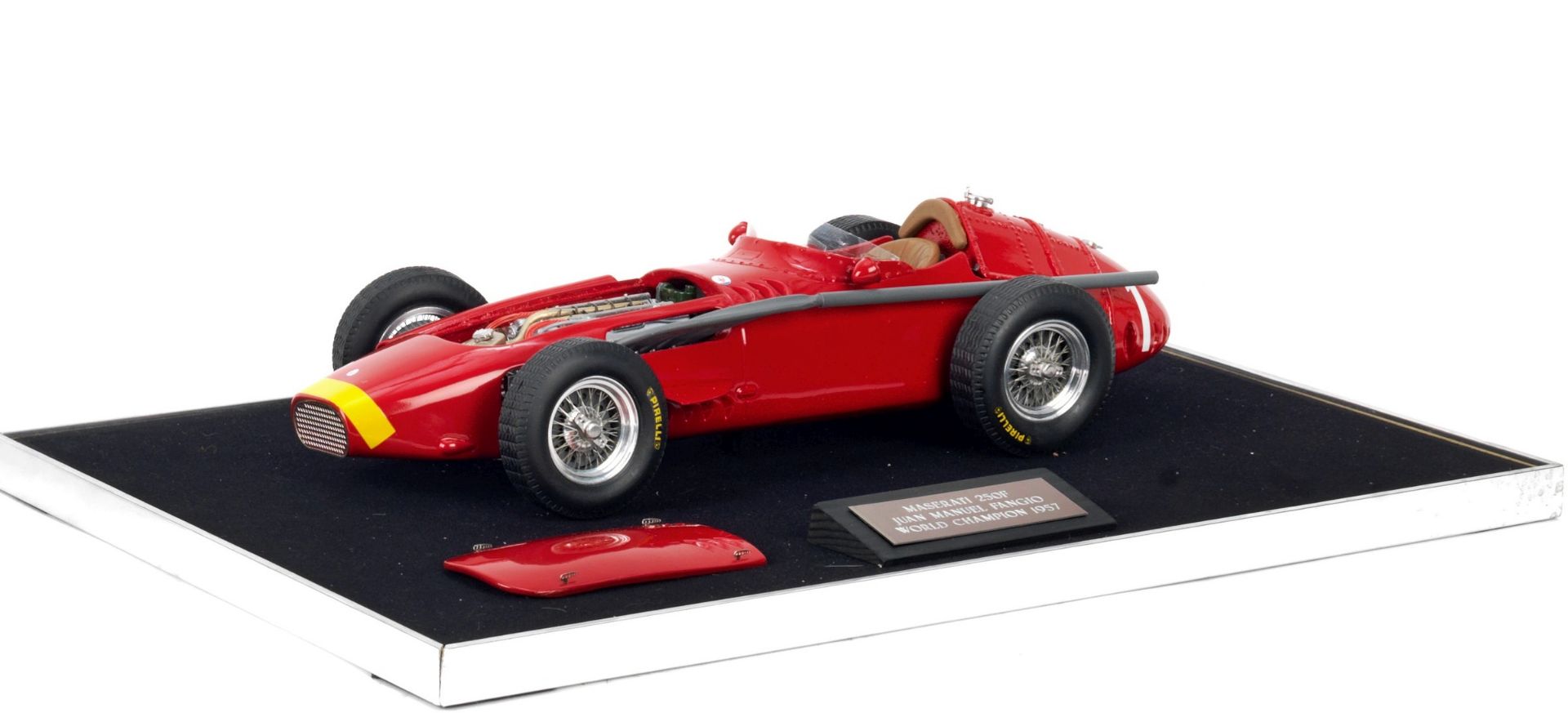 A 1:12 scale model of Juan Manuel Fangio's 1957 World Championship winning Maserati 250F, by Midl...