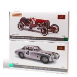 Two boxed 1:18 scale race-winning Mercedes models, by CMC Models of Germany, ((2))