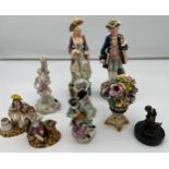 A Collection of 18th/ 19th and 20th century porcelain figures to include meissen dog and gentleman