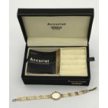 A Ladies 9ct yellow gold evening watch produced by Accurist. [11.74grams]