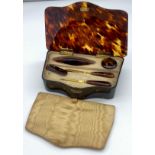 Antique tortoise shell manicure set with silver hinge