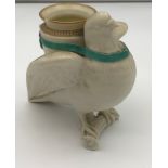 A 19th century porcelain Royal Worcester Dove vase. A Dove standing upon a branch, holding and urn