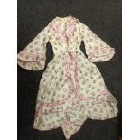 A Large quantity of Antique and vintage hand made ladies evening dresses & skirts.