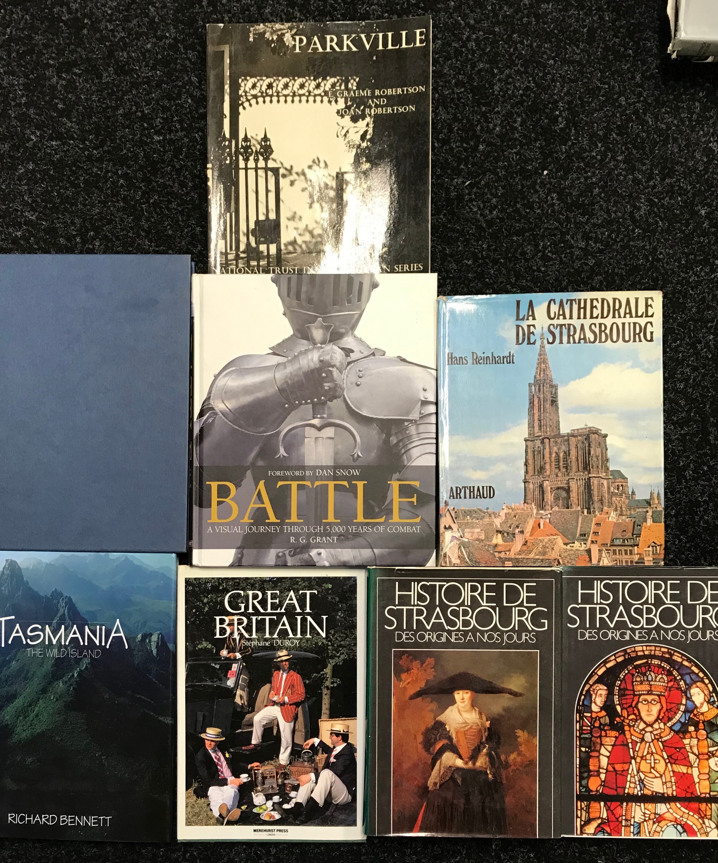 Nine books with topics History, Great Britain, Atlas of The World, 5000 Years of Battles etc