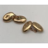 A Pair of 9ct yellow gold cuff links. [6.10grams]