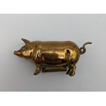 An Antique novelty pig shaped measuring tape. [5cm]