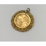 A 1907 Edward VII half Gold Sovereign with a gold pendant mount.