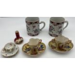 A Collection of antique porcelain to include two panel painted Meissen style loving cups with