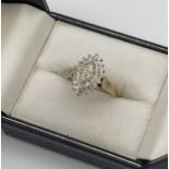 A ladies 9ct yellow gold diamond cluster ring [.15ct][Ring size] [3.18grams]