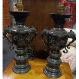 A Pair of Japanese Bronze urn vases. Turned into table lamps.