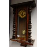 Antique wall clock, comes with pendulum and key. [67cm in height]