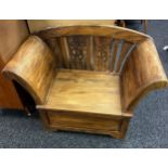 A Hardwood two seat window chair with storage section. [84x108x56cm]