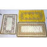 A Collection of antique and vintage embroidered table covers and wall panels, table covers