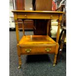 A Yew wood two tier side table with pull out green leather writing area. [61x47x47cm]