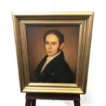 An Antique oil painting on canvas depicting a gentleman's portrait. Fitted within a gilt frame. [