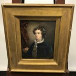 Antique painting depicting a Young Queen Victoria. Fitted within a thick wooden and gilt frame. [