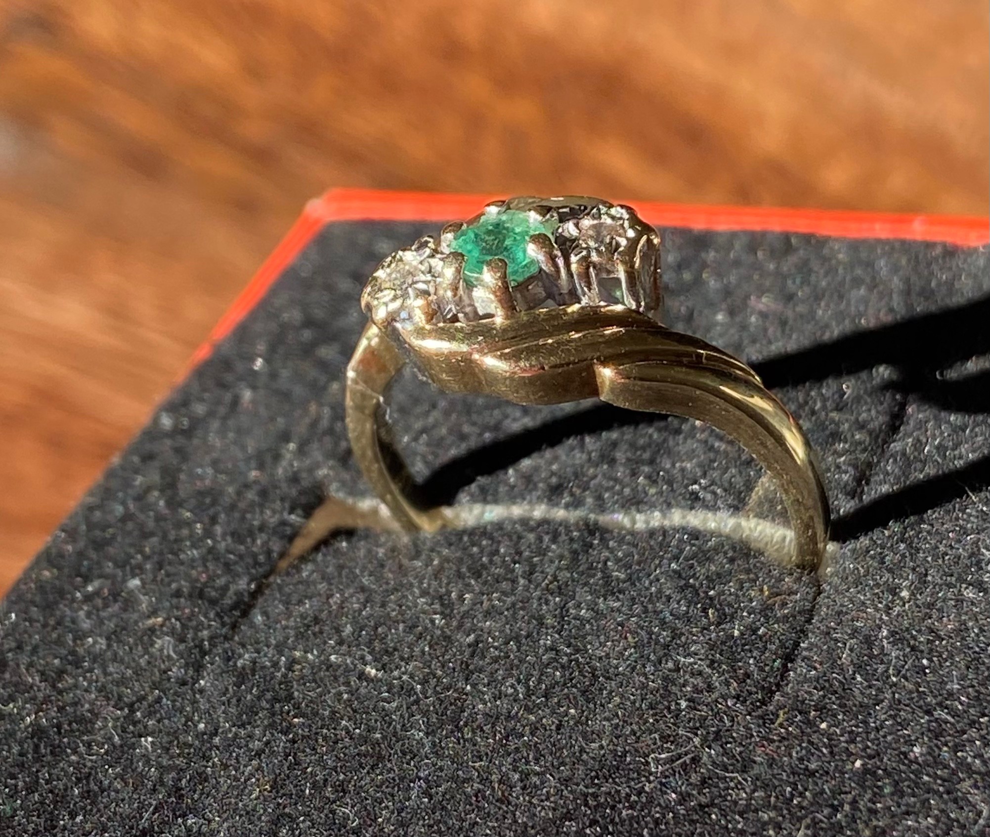 An 9ct yellow gold ladies ring set with a single emerald and two single diamonds [Ring size L] [2. - Image 3 of 3
