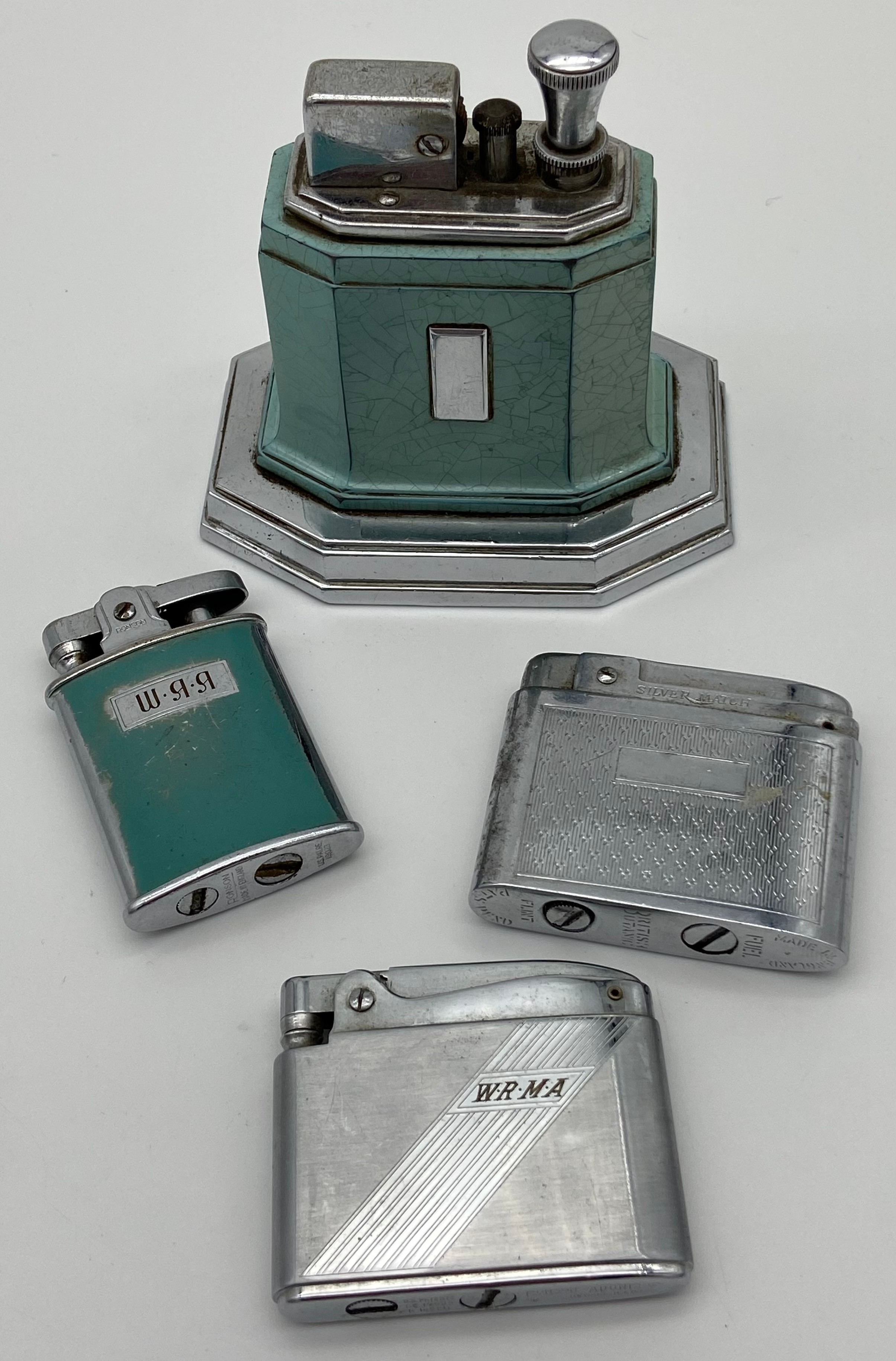 A Lot of four vintage lighters to include Ronson Touch- Tip, Ronson Pat No. 19.023, Ronson Adonis