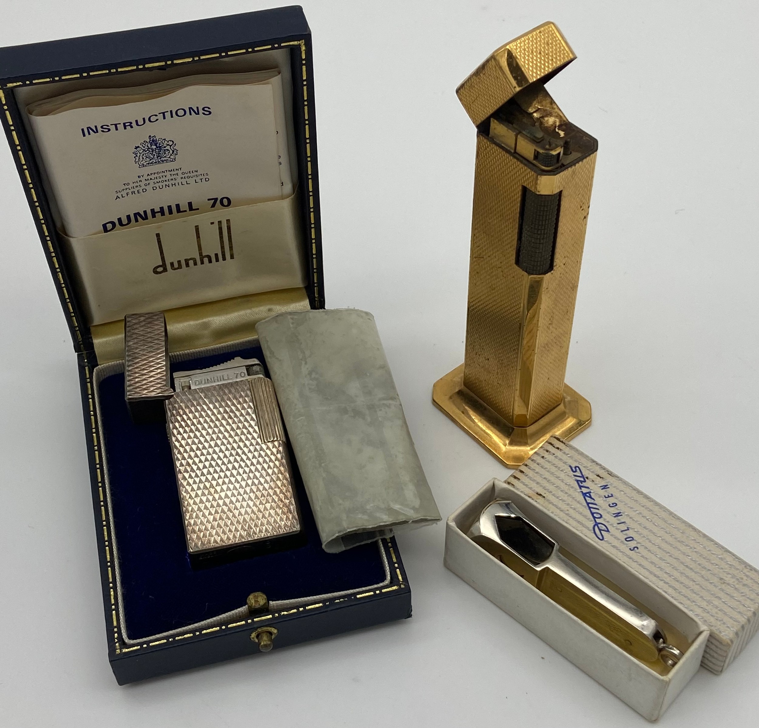 Two vintage Dunhill lighters to include plated Dunhill 70 lighter, box, booklet & Dunhill Tallboy