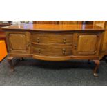 19th century sideboard, the rectangular top above two bow front drawers, flanked by two panel