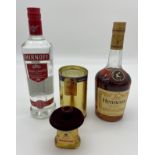 Mixed lot; Bells miniature [boxed], Smirnoff vodka, Hennessy Cognac