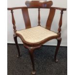 Edwardian inlay corner chair, raised on cabriole legs and pad feet [76x53cm]