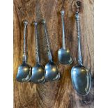 Three Danish Silver marked spoons with twist stem shafts, produced by Simon Groth. Together with two